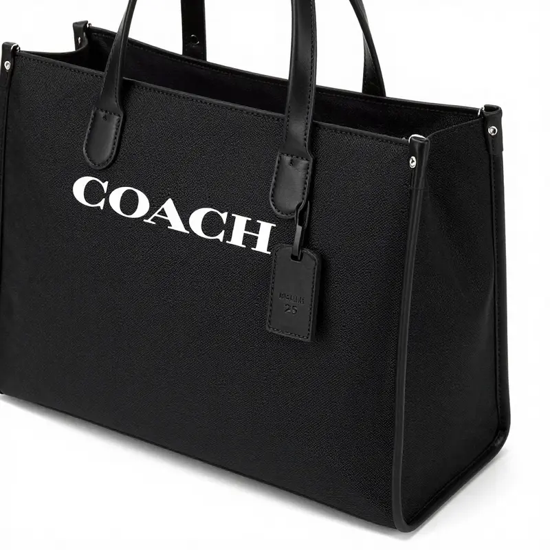 The COACH Mollie Tote Bag 25 in Signature Canvas exemplifies style and utility.